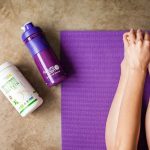 purple and white plastic bottle